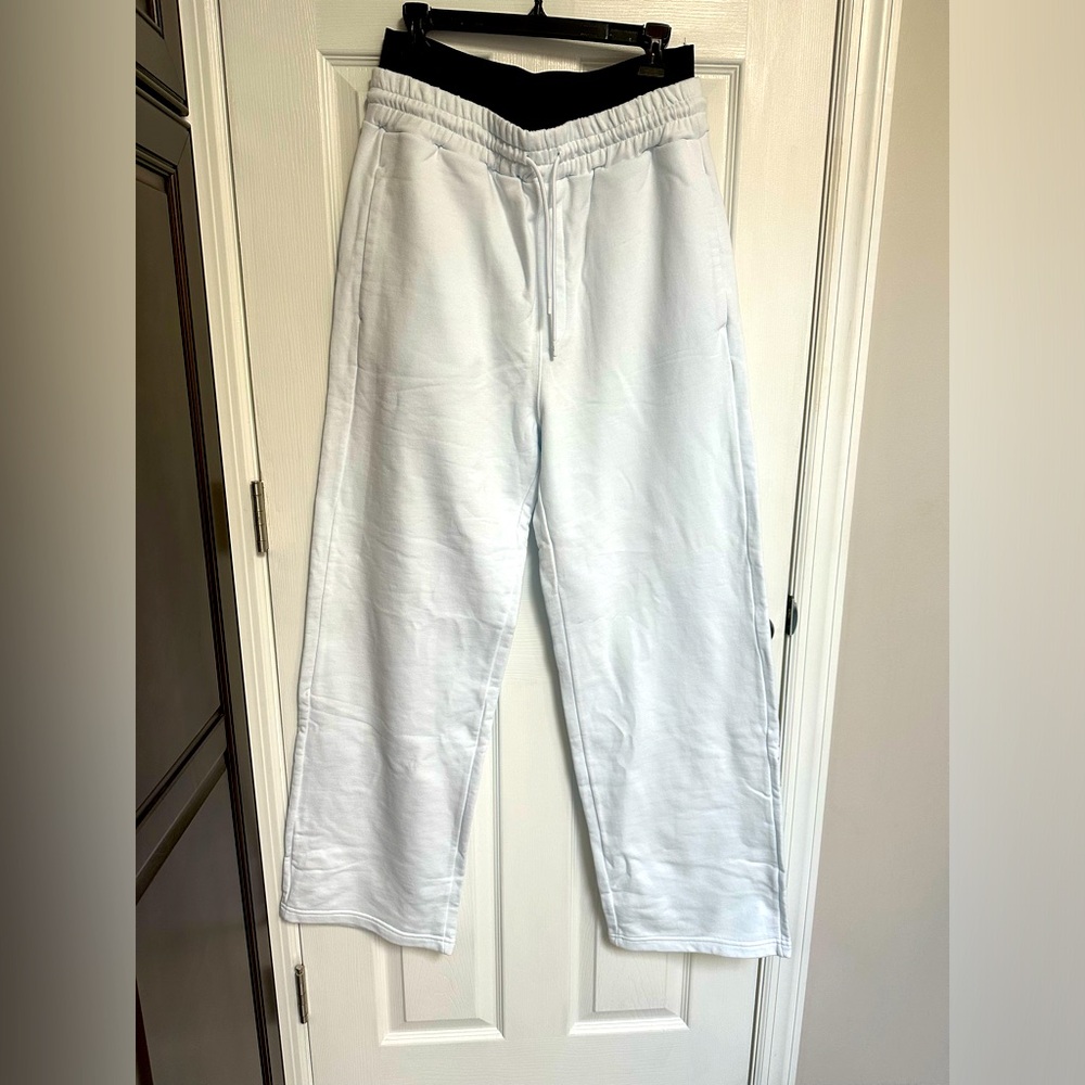 Brand new MSGM white pants with black elastic logo in size L